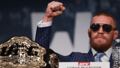 Conor McGregor with the UFC title.
