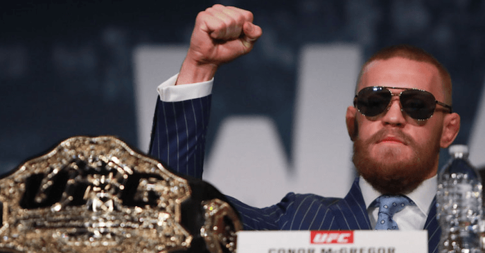 Conor McGregor with the UFC title.