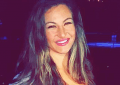 Former UFC bantamweight champion Miesha Tate is all smiles.