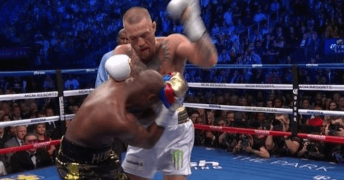 Conor McGregor touches up Floyd Mayweather