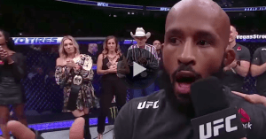 UFC flyweight champion Demetrious Johnson reacts to breaking UFC legend Anderson Silva's title defense record at UFC 216.