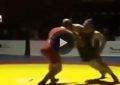 Wrestling KO during a match after a frustrated wrestler throws an elbow and knocks out his opponent.