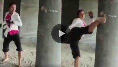 Female Muay Thai practitioner's kicking routine.