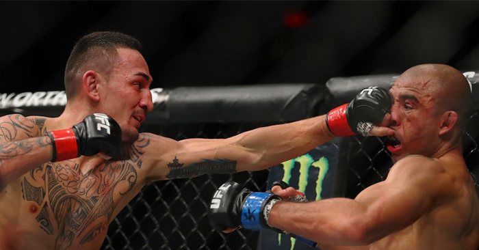 Max Holloway stops Jose Aldo at UFC 218.